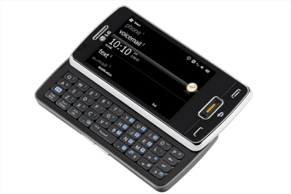 LG eXpo GW820 smartphone with detachable DLP pico projector, displaying content on a wall.