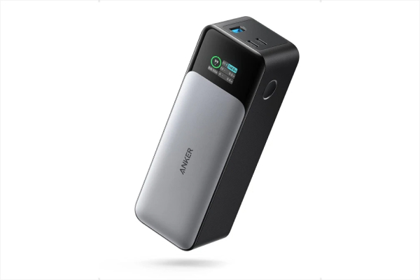 High-capacity charger with display, powering iPad and devices on the go.