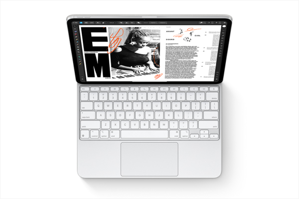 Slim backlit keyboard with trackpad connected to iPad