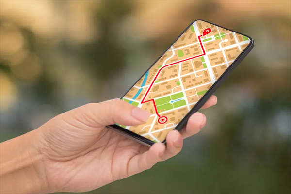 Smartphone showing GPS navigation with real-time traffic, replacing a bulky car GPS device.