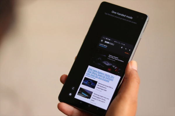 Shrink screen size for easier one-handed use on large phones.