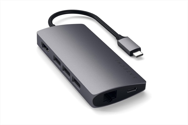 Multiport hub adding HDMI, USB, and SD card access to iPad.