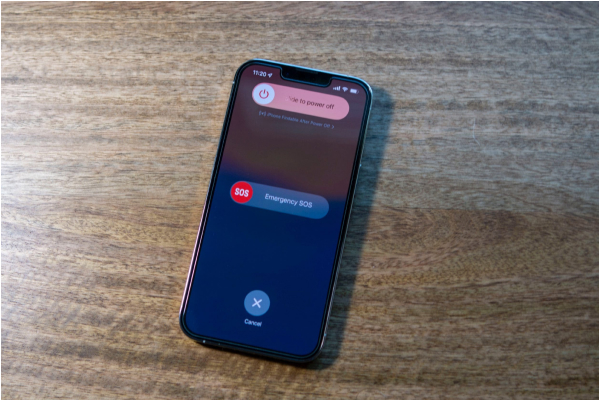 Icon of a power button or iPhone restarting. Represents restarting the device to fix temporary glitches in iOS 26 beta.