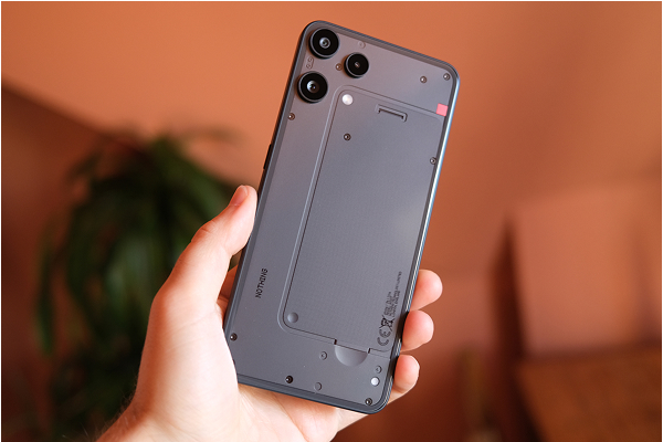 Glass back, aluminum frame, minimalist style, and clean aesthetic with a simplified Glyph LED.