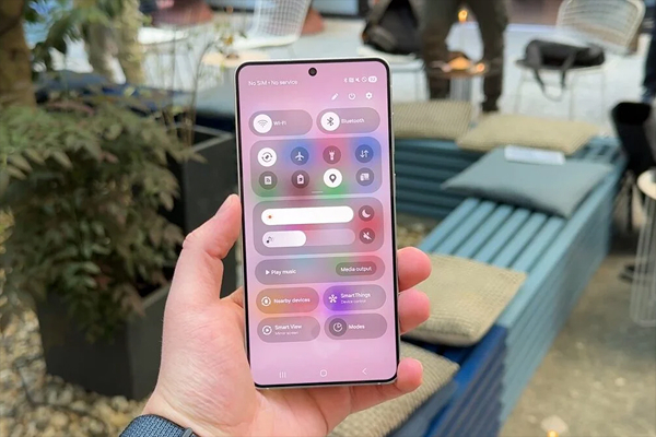 Samsung Galaxy smartphone showing One UI quick settings and controls